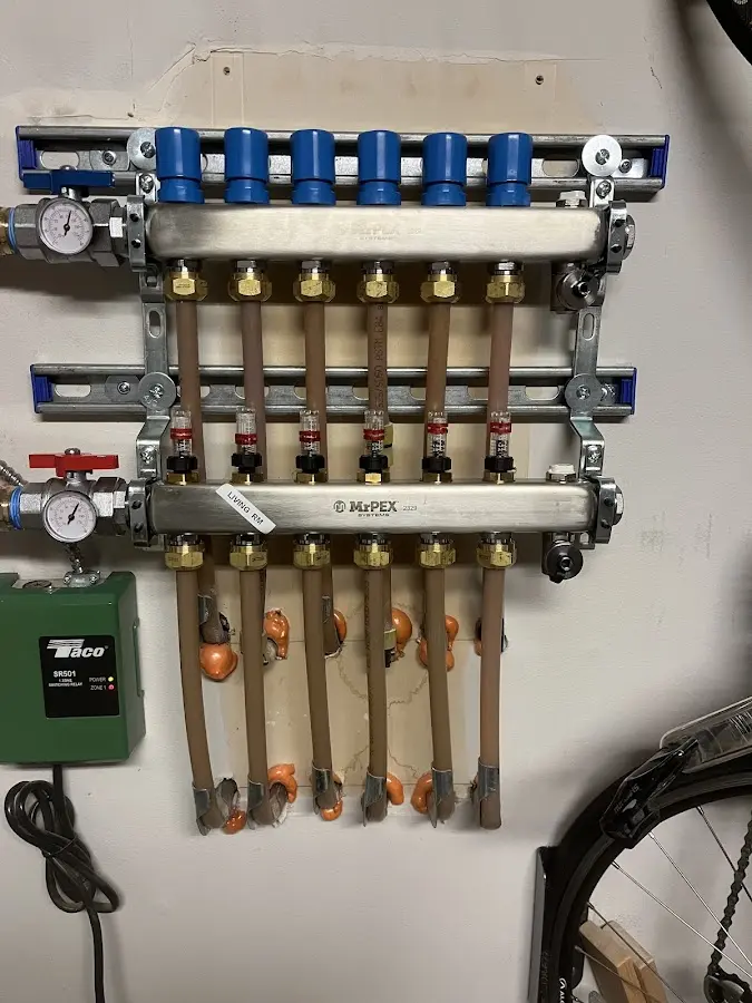 Plumber performing Gas Leak Detection at a residential property in Summit